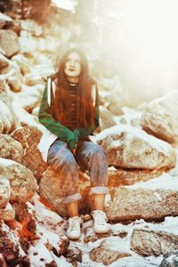 Portrait of young woman in forest