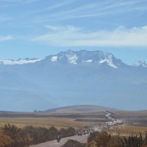 Scenic view of mountains against cloudy sky