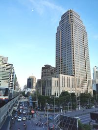 Modern buildings in city against sky