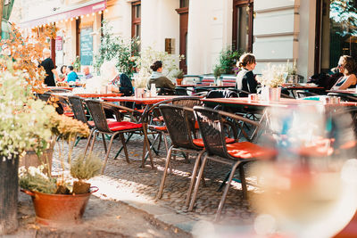 People in sidewalk cafe