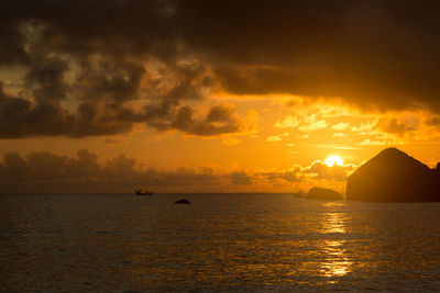 Scenic view of sea against sky during sunset