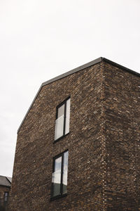 Low angle view of building against clear sky