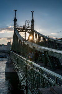 Bridge over river against sky