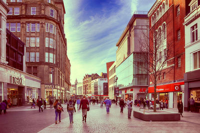People walking on city street