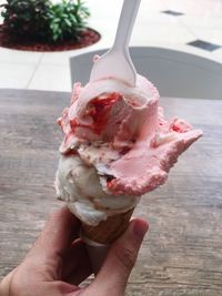 Midsection of person holding ice cream