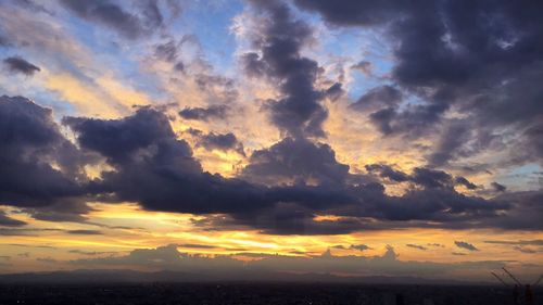 Scenic view of dramatic sky during sunset