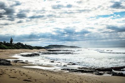 Scenic view of beach against sky