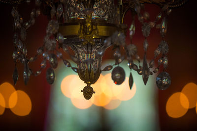 Low angle view of illuminated chandelier