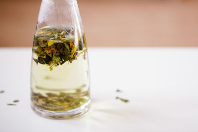 Close-up of tea in glass on table