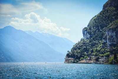 Scenic view of bay against mountains