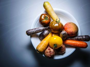 High angle view of eggs in plate on table