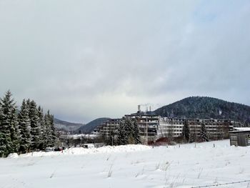 Scenic view of mountains against sky during winter