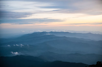 Scenic view of mountains against sky during sunset