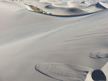 High angle view of sand dunes at beach