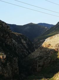 Scenic view of mountains against clear sky