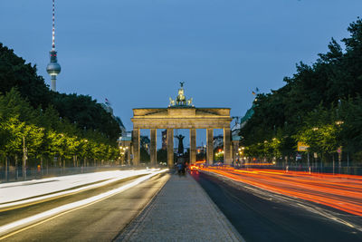 Light trails on road in city