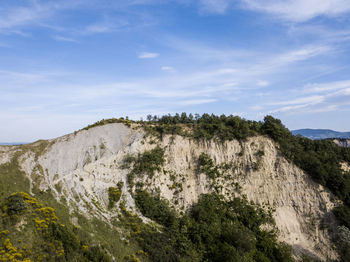 Scenic view of mountains against sky - calanchi tipici delle colline emiliano rimagnole