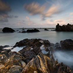 Scenic view of sea against sky during sunset