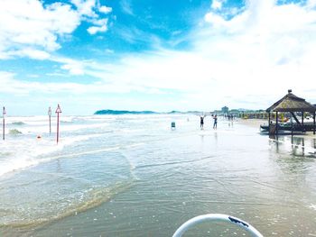 Scenic view of sea against cloudy sky