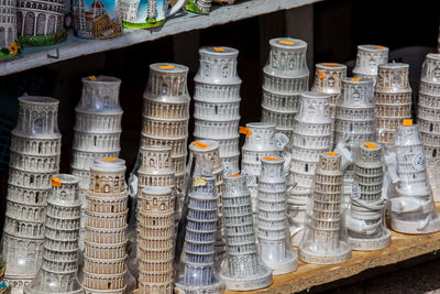 Close-up of bottles in shelf for sale