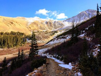 Scenic view of mountains against sky during winter