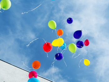 Low angle view of colorful balloons