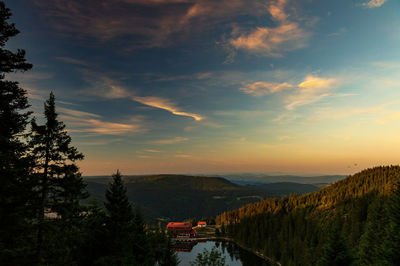 Scenic view of bridge against sky during sunset