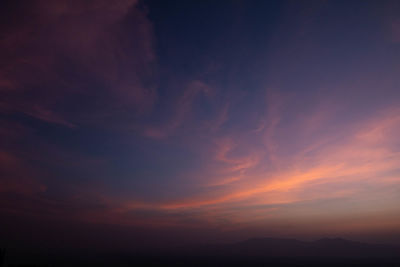 Low angle view of dramatic sky during sunset