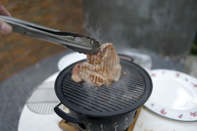 Close-up of meat on barbecue grill