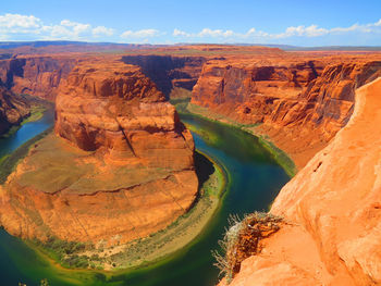 Scenic view of rock formations against sky