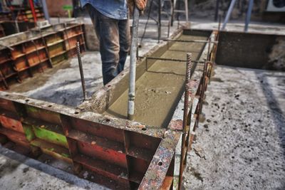 Midsection of man working at construction site