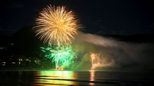 Firework display at night