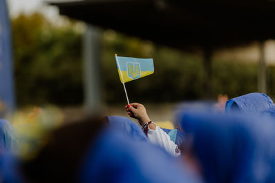 Woman holding ukrainian flag