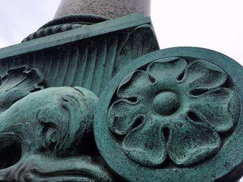 Low angle view of statue against sky