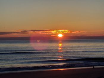 Scenic view of sea during sunset