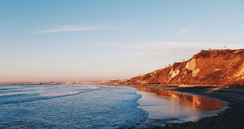 Scenic view of beach against sky