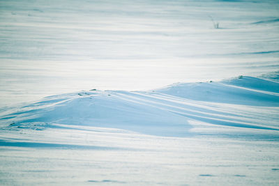 Aerial view of snow covered land