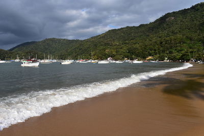 Scenic view of beach against sky