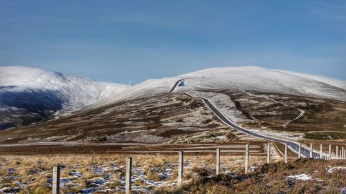 Snow covered mountain against sky