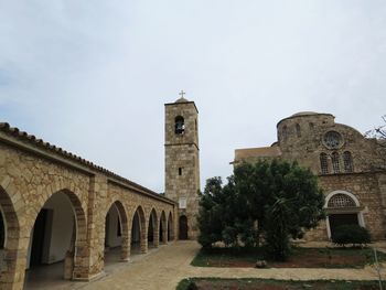 Low angle view of historic building against sky
