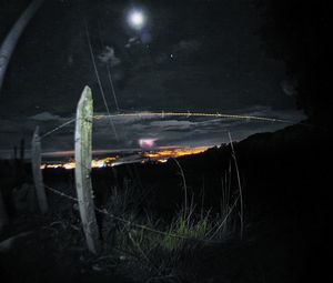 Light trails against sky at night