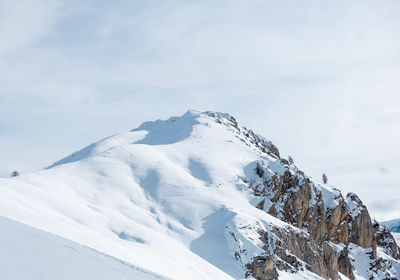 Scenic view of snowcapped mountain against sky