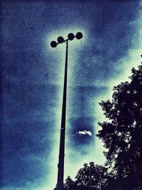 Low angle view of trees against sky