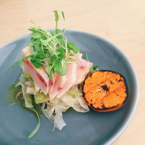 High angle view of vegetables in plate on table