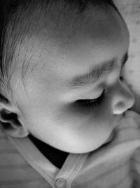 Close-up of cute baby girl sleeping