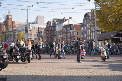 People walking on city street