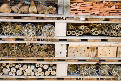 Full frame shot of various wooden objects on shelf