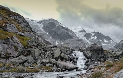 Scenic view of mountains against sky during winter