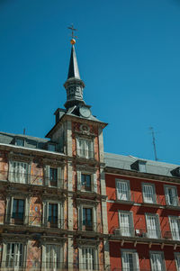 Facade of casa de la panaderia, bakery house, old building on the plaza mayor in madrid, spain.