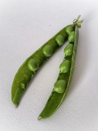 Close-up of green chili pepper on table